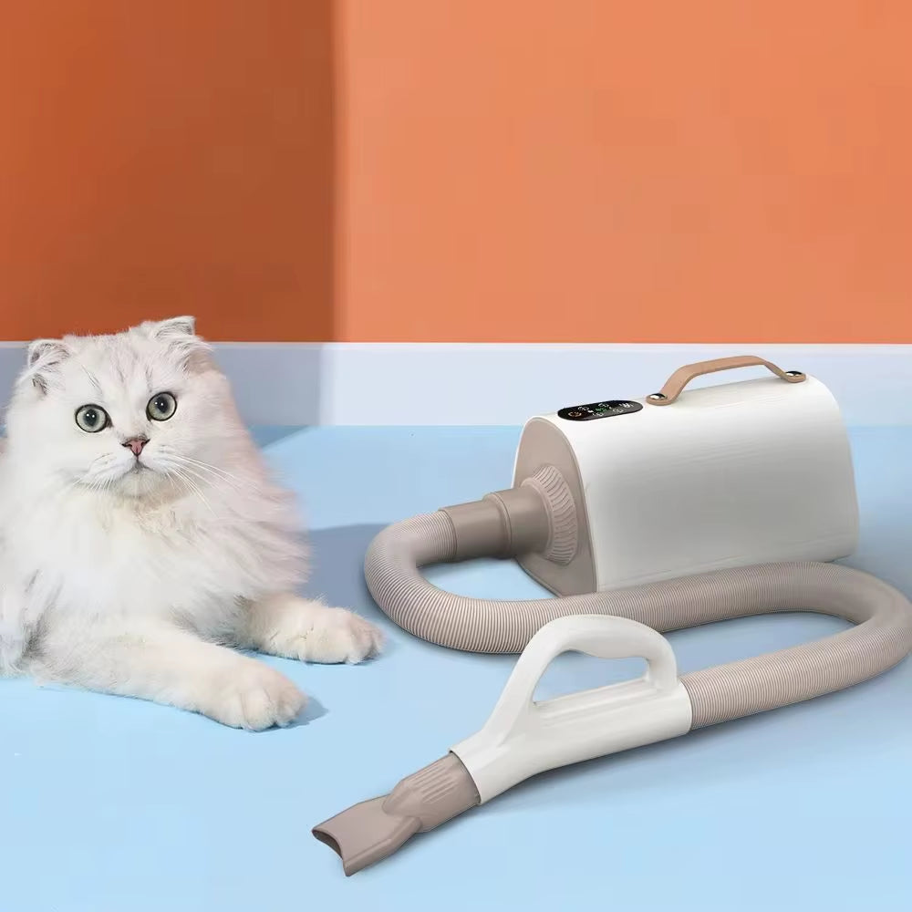 Pet grooming hair dryer showing variable speed control and ergonomic design